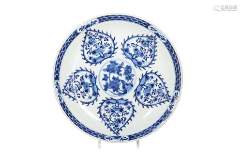 A blue and white porcelain deep charger, decorated with flow...