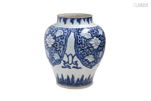 A blue and white porcelain vase, decorated with flowers. Unm...