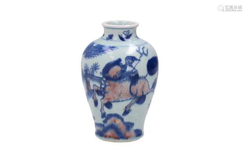 A blue, white and red porcelain vase, decorated with a kylin...