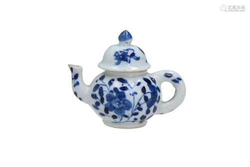 A blue and white porcelain miniature teapot, decorated with ...