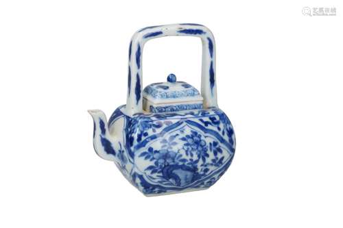 A blue and white porcelain teapot, decorated with flowers. U...