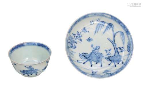 A blue and white porcelain cup with saucer from the Ca Mau B...