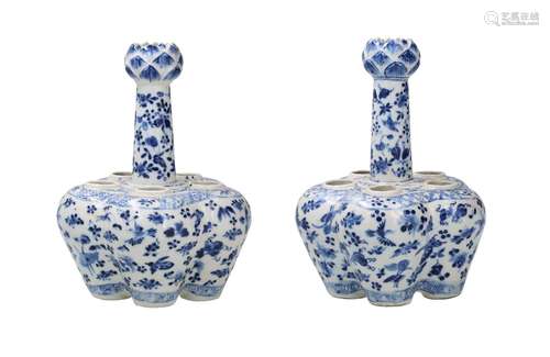 A pair of blue and white porcelain tulip vases, decorated wi...