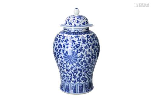 A blue and white porcelain lidded vase, decorated with flowe...