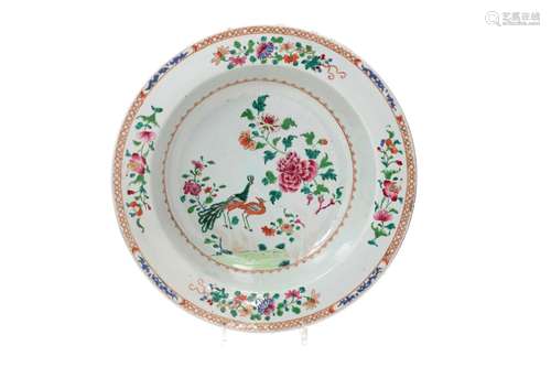 A famille rose porcelain deep bowl, decorated with flowers a...