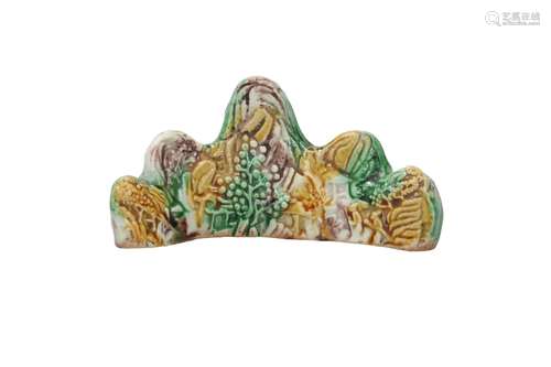 A Sancai glazed emaille sur biscuit brush rest, decorated wi...