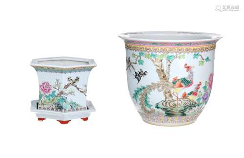 A polychrome porcelain cachepot, decorated with birds, flowe...