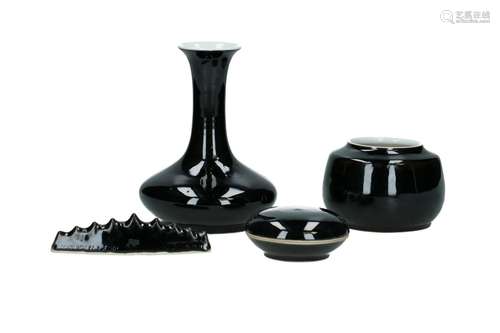 A black glazed porcelain scolar set, consisting of a brush w...