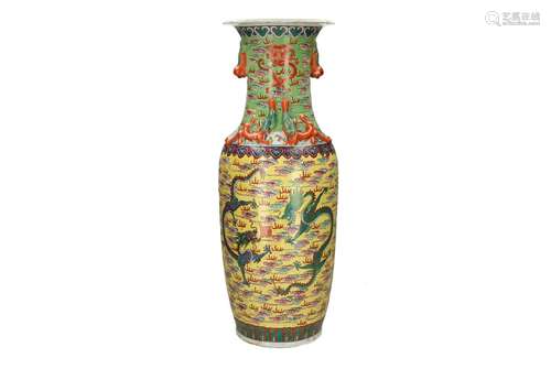 A polychrome porcelain vase, decorated with dragons in the c...