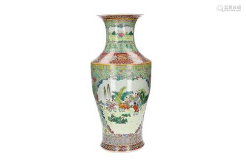 A polychrome porcelain vase, decorated with little boys play...