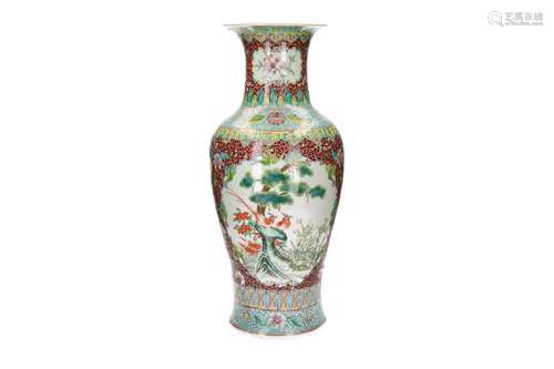 A polychrome porcelain vase, decorated with flowers and bird...