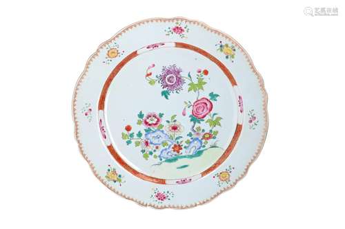 A famille rose porcelain cherger with scalloped rim, decorat...