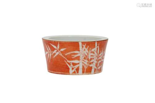 A white and coral red porcelain bowl, decorated with bamboo ...