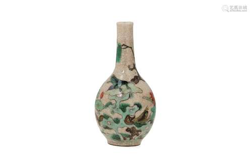 A polychrome porcelain vase, decorated with flowers and frog...