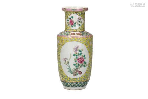 A polychrome porcelain vase, decorated with peonies and plum...