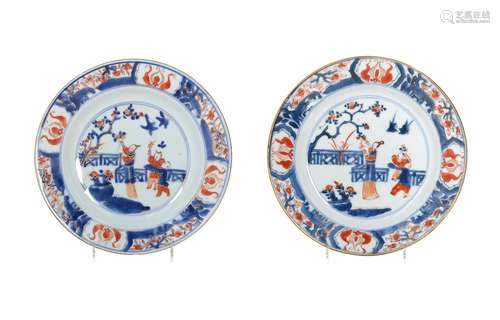 A pair of Imari porcelain dishes, decorated with a figure an...