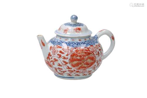 A blue, white and red porcelain teapot, decorated with flowe...