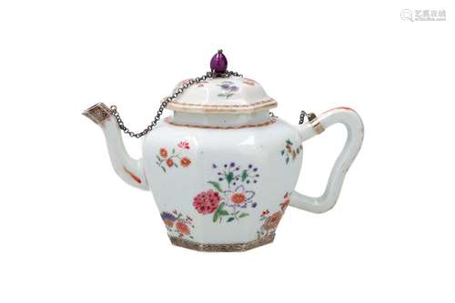 An octagonal polychrome porcelain teapot with silver mountin...