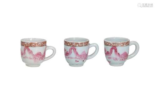 A set of three famille rose miniature cups, decorated with a...