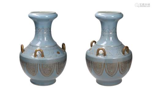 A pair clair de lune and gilt porcelain vases with four gilt...