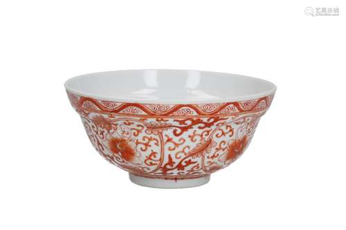 An iron red and white porcelain bowl, decorated with flowers...