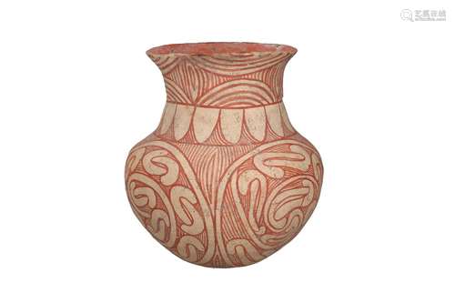 A Ban Chiang ceramic pot with a round base and geometric dec...