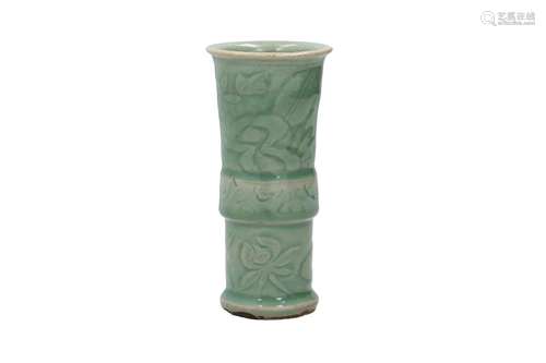 A celadon glazed porcelain vase with underglaze decor of flo...