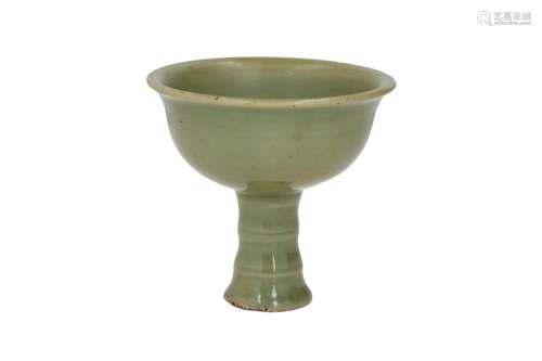 A celadon glazed porcelain stem cup. Unmarked. China, Ming. ...