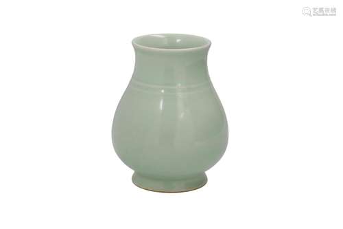 A celadon glazed porcelain vase. Marked with seal mark Qianl...