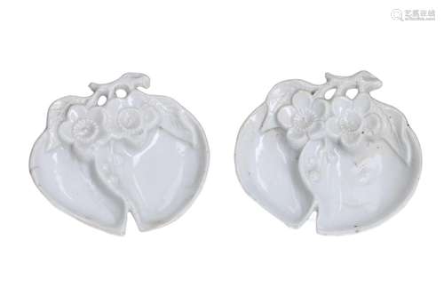 A pair of blanc de Chine peach-shaped porcelain brush washer...