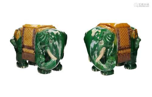 A pair of sancai glazed earthenware sculptures in the shape ...