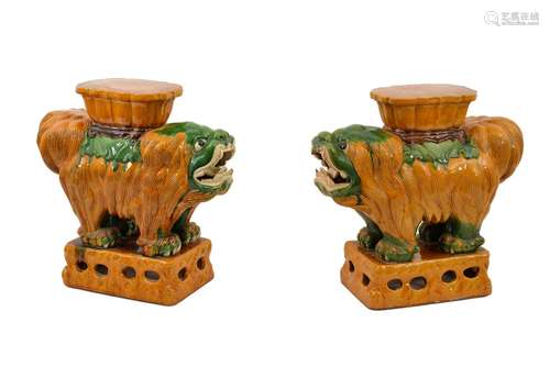 A pair of sancai glazed earthenware sculptures in the shape ...