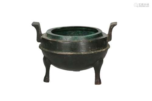 A bronze tripod censer with two handles. Unmarked. China, Ha...