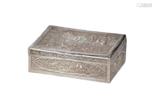 A silver lidded box, decorated with flowers and birds. The l...