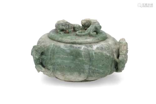 A green stoneware lidded box with relief decor of dragons ch...