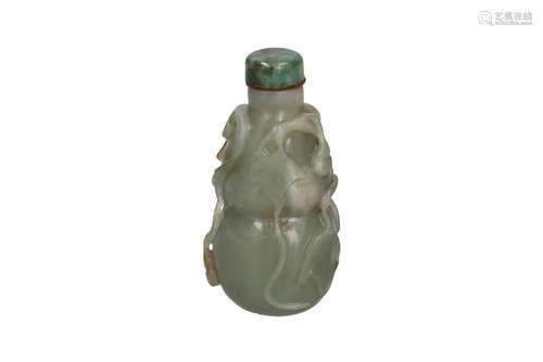 A carved jade snuff bottle with a floral decor of ivy. Unmar...