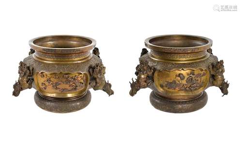 A set of two bronze incense burners with relief decor of ins...