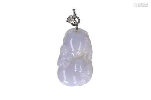 A carved jade pendant in the shape of fruits and little boys...