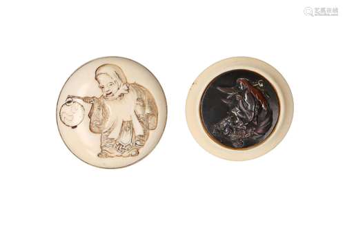 Lot of two round ivory manju-netsuke, 1) old man with lanter...