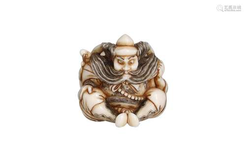 An ivory netsuke of Shoki holding a bag of ori. Signed Yyusa...