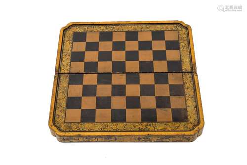 A lacquered folding chess and backgammon board with gilded d...