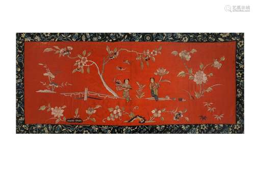 A silk embroidery in frame, depicting flowers and figures. C...