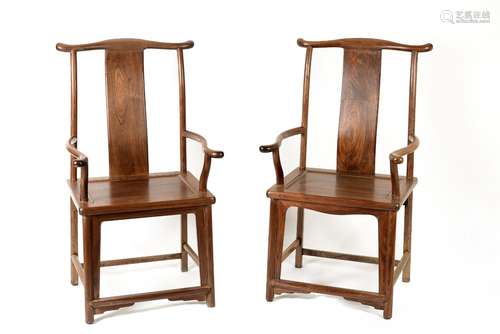 A pair of rosewood official's hat armchairs. China, 20t...