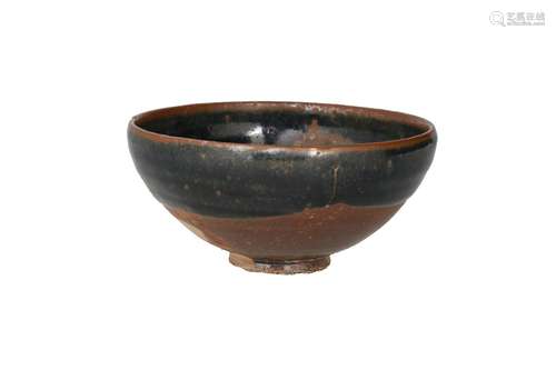 A black Cizhou ware Jun bowl with russet splash decor. Unmar...