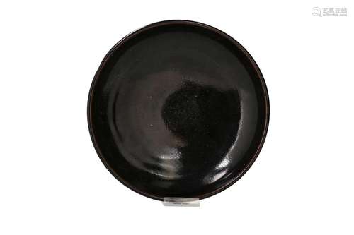 A black glazed deep dish. Unmarked. China, Song. H. 6 cm. Di...