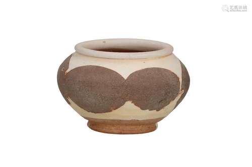 A Cizhou ware bowl, decorated with brown circles. Unmarked. ...