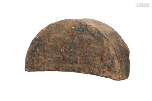 A terracotta roof tile with decor of taotie. China, Warring ...