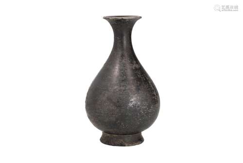 A black pottery Yu Hu Chun bottle. Unmarked. China, 14th cen...