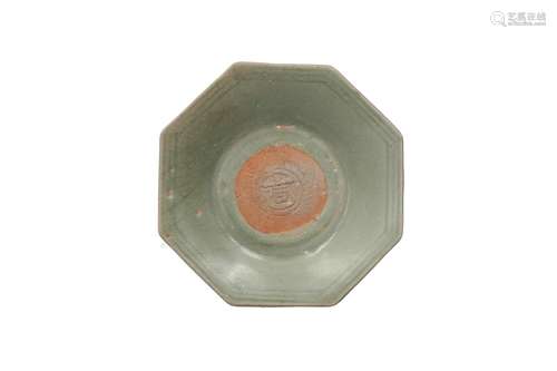 An octagonal Longquan dish with unglazed base and center. Th...