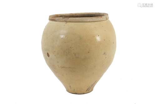 A creamish/white glazed jar. Unmarked. China, Liao. H. appro...